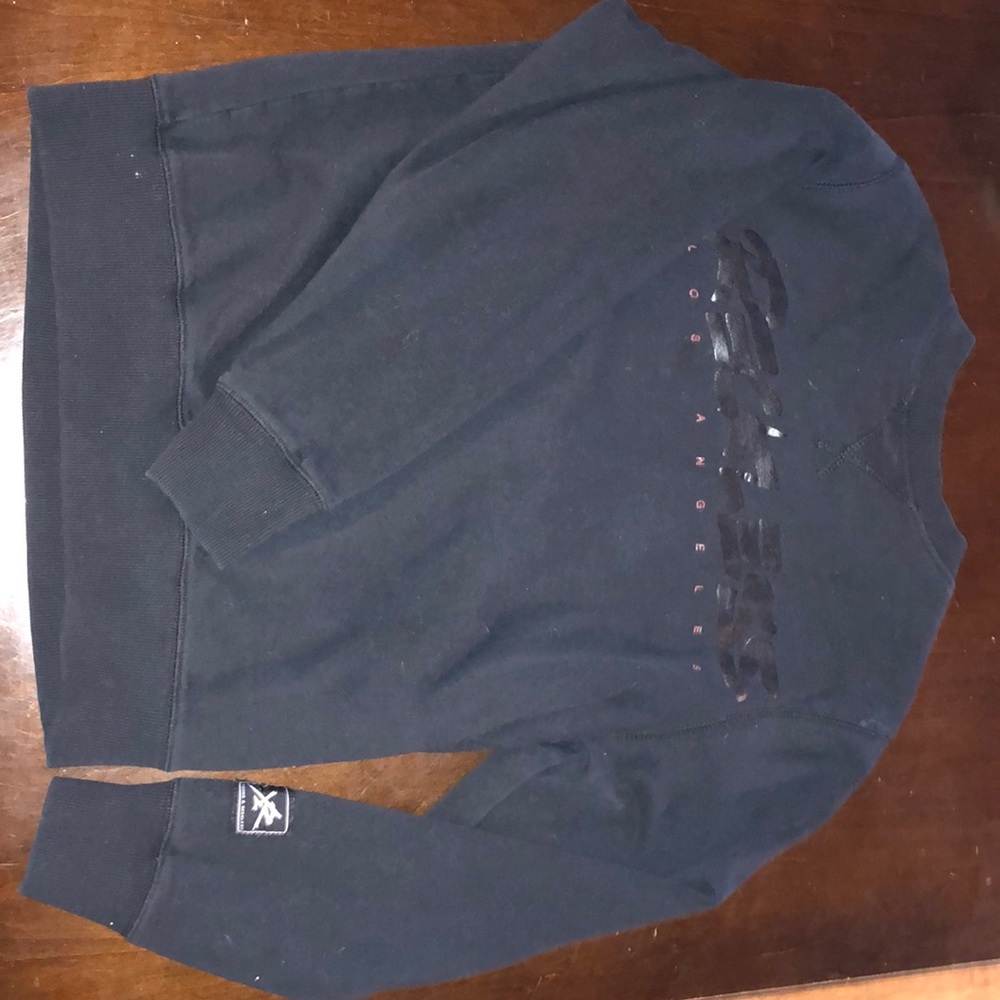 Young and reckless sweater